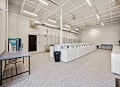 Thumbnail 11 of 35 - Laundry Center - washers and dryers
