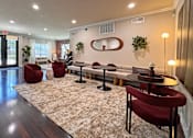 Thumbnail 1 of 26 - Relaxing resident lounge.
