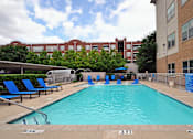 Thumbnail 4 of 26 - A swimming pool with a depth marker at 3 feet.