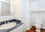 Thumbnail 42 of 42 - a bathroom with a sink toilet and a mirror