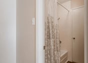 Thumbnail 34 of 37 - a small bathroom with a closet and a staircase
