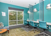 Thumbnail 13 of 48 - a conference room with chairs and a table and a window