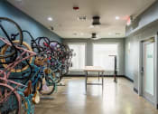 Thumbnail 30 of 54 - a room with a bunch of bikes on the wall
