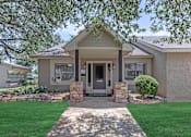 Thumbnail 1 of 43 - the front of a house with a walkway and grass