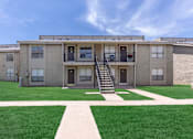 Thumbnail 7 of 43 - an exterior view of a building with a lawn