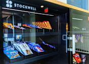 Thumbnail 17 of 28 - a vending machine filled with candy bars