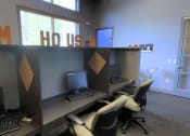 Thumbnail 13 of 14 - an office with two computers and two chairs