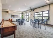 Thumbnail 17 of 26 - game room with a pool table and tables