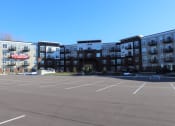 Thumbnail 2 of 24 - Bright sunshine warms the building