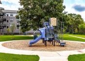 Thumbnail 22 of 26 - a playground with a blue slide