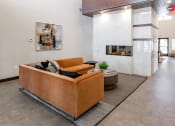 Thumbnail 10 of 37 - the preserve at ballantyne commons living room with couch and fireplace