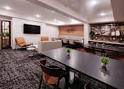 Thumbnail 26 of 37 - a conference room with a large table and chairs
