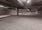 Thumbnail 36 of 37 - the inside of a parking garage in a building