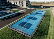 Thumbnail 17 of 37 - an aerial view of the tennis court at the resort
