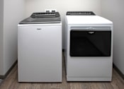 Thumbnail 9 of 37 - Two white Wingspan ovens in a kitchen.