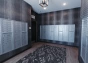 Thumbnail 20 of 29 - a locker room with lockers and wardrobes and a rug