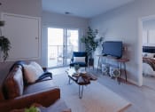 Thumbnail 3 of 29 - a living room with a couch and a tv