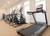 Thumbnail 12 of 22 - A treadmill in Gym at Alta Apartments, Wisconsin