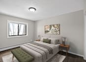 Thumbnail 15 of 32 - A bedroom with a bed, nightstand, and window.