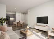 Thumbnail 10 of 15 - A modern living room with a grey sofa, a wooden coffee table, and a television on a white cabinet.