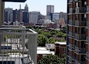 Thumbnail 10 of 28 - A view of a city from a high rise building.