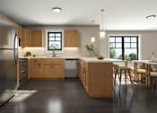 Thumbnail 8 of 11 - A modern kitchen with wooden cabinets and a large island.