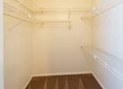 Thumbnail 22 of 23 - Empty white shelves in a room.