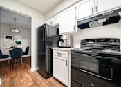 Thumbnail 3 of 11 - Modern Kitchen at Mountain Place Apartments, Georgia, 30083
