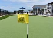 Thumbnail 9 of 23 - A view of our putting green with a Masters flag at The Parker North Augusta, North Augusta, South Carolina