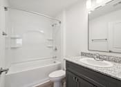 Thumbnail 17 of 23 - A white bathroom at The Parker North Augusta, North Augusta, SC, 29841