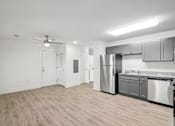 Thumbnail 12 of 23 - A kitchen with a refrigerator at The Parker North Augusta, North Augusta, SC, 29841