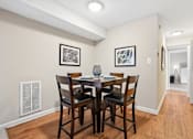 Thumbnail 4 of 51 - Dining area with high top table and chairs at The Palms Apartments, Charleston, SC