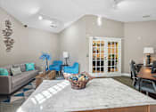 Thumbnail 3 of 36 - A living room with a marble table and a couch  at Cape Landing, Myrtle Beach, 29588