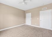 Thumbnail 38 of 39 - Spacious bedroom with ceiling fan and carpet at The Lory of Greenway Village Apartments, Kentucky, Kentucky