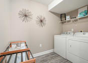 Thumbnail 35 of 36 - White washer and dryer in a laundry room with a white dryer  at Cape Landing, Myrtle Beach, SC
