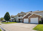 Thumbnail 21 of 39 - Brick townhomes with two car garages at The Lory of Greenway Village Apartments, Kentucky, 42001