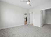 Thumbnail 48 of 51 - Empty bedroom with walk-in closet at The Palms Apartments, Charleston, 29407