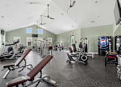 Thumbnail 22 of 39 - Fitness center with cardio and weight machines at The Lory of Greenway Village Apartments, Kentucky