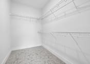 Thumbnail 43 of 51 - Walk-in closet with wire shelving at The Palms Apartments, Charleston