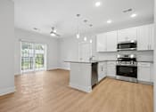 Thumbnail 47 of 51 - Bright open floor plan with pendant lighting at The Palms Apartments, South Carolina, 29407