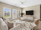 Thumbnail 7 of 39 - Living room with modern furniture and wall mounted tv at The Lory of Greenway Village Apartments, Kentucky