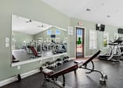 Thumbnail 39 of 39 - Fitness center with cardio and weight equipment at The Lory of Greenway Village Apartments, Kentucky, 42001