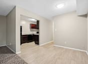 Thumbnail 9 of 51 - Open dining room with view into kitchen at The Palms Apartments, Charleston, 29407