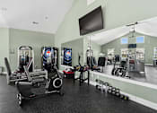 Thumbnail 37 of 39 - Fitness center with cardio and weight training equipment at The Lory of Greenway Village Apartments, Kentucky, KY 42001