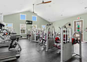 Thumbnail 28 of 39 - A gym with treadmills, elliptical machines, and other exercise equipment. at The Lory of Greenway Village Apartments, Kentucky