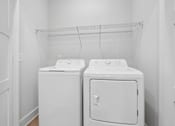 Thumbnail 51 of 51 - Inunit laundry with top load washer and dryer at The Palms Apartments, Charleston, SC