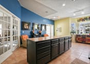 Thumbnail 8 of 36 - Lobby of a house with a bar and a living room  at Cape Landing, Myrtle Beach