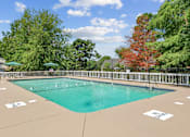 Thumbnail 9 of 26 - A large outdoor swimming pool at Emerald Bay, Charlotte, NC, 28217