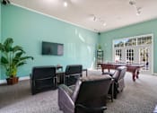 Thumbnail 5 of 36 - Living room with a pool table and chairs  at Cape Landing, Myrtle Beach