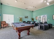 Thumbnail 6 of 36 - Game room with a pool table and leather furniture  at Cape Landing, Myrtle Beach, 29588